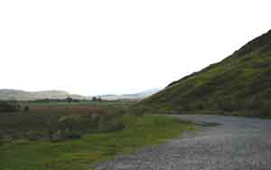 Wild open road from Mosedale to Mungrisdale; common land, fells and grey skies