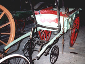 small, green, children's size cart
