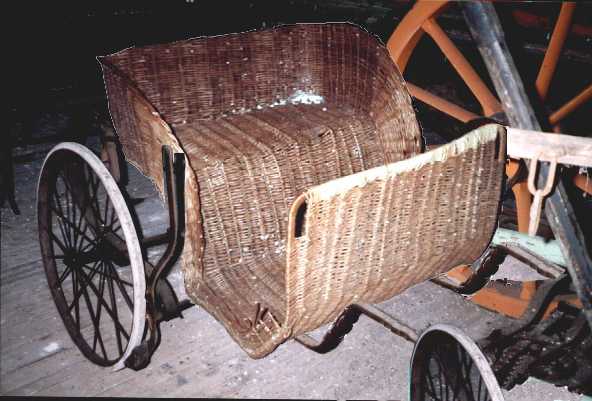low 4 wheel wicker chaise